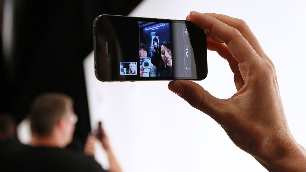 An Apple employee demonstrates 