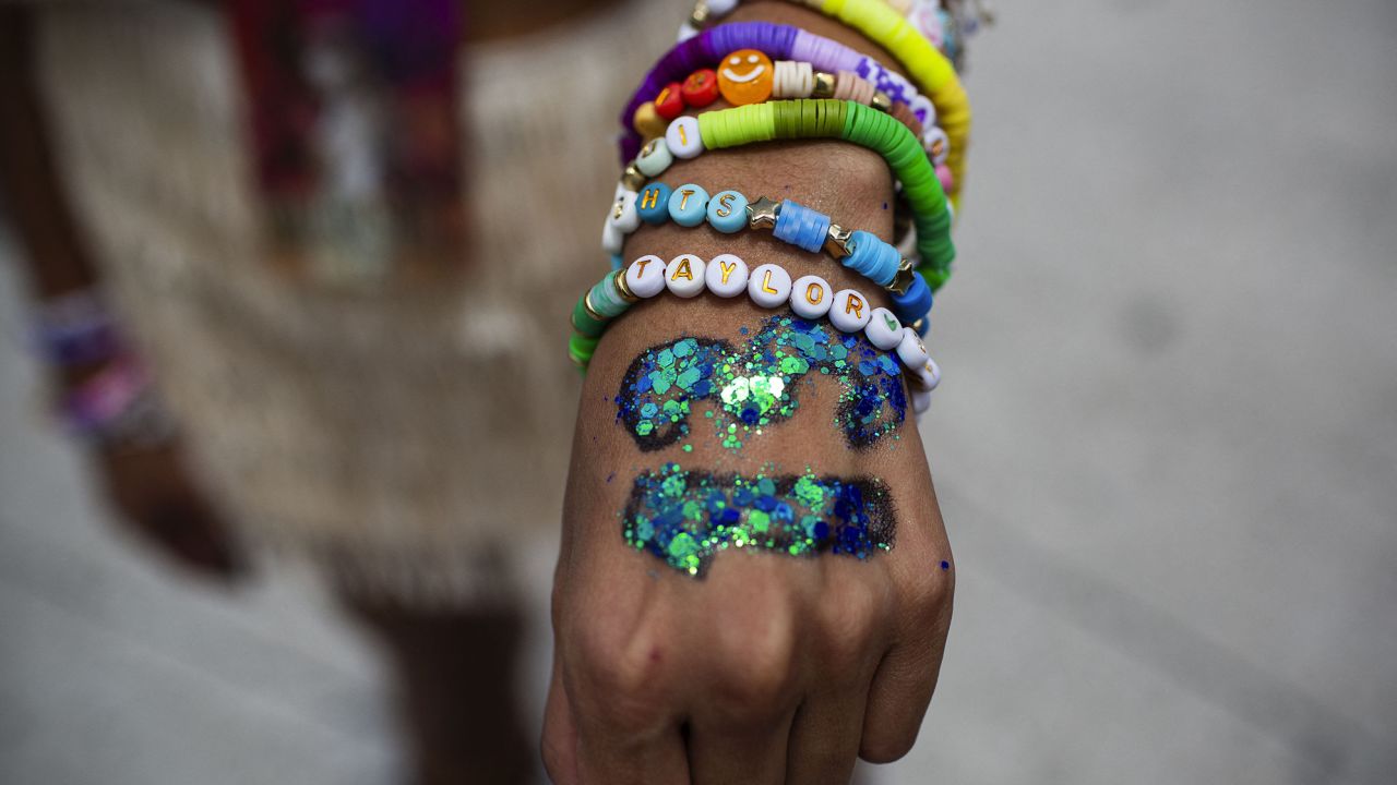 A fan shows a bracelet with the name of US superstar Taylor Swift before her presentation at the Foro Sol in Mexico City on August 24, 2023.