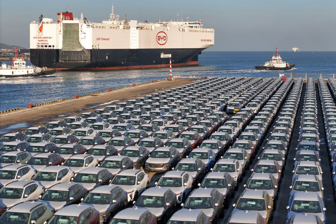 Electric cars for export wait to be loaded onto a ship at Yantai port, in eastern China's Shandong province earlier this year.